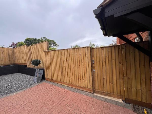 Wooden fencing and landscaping